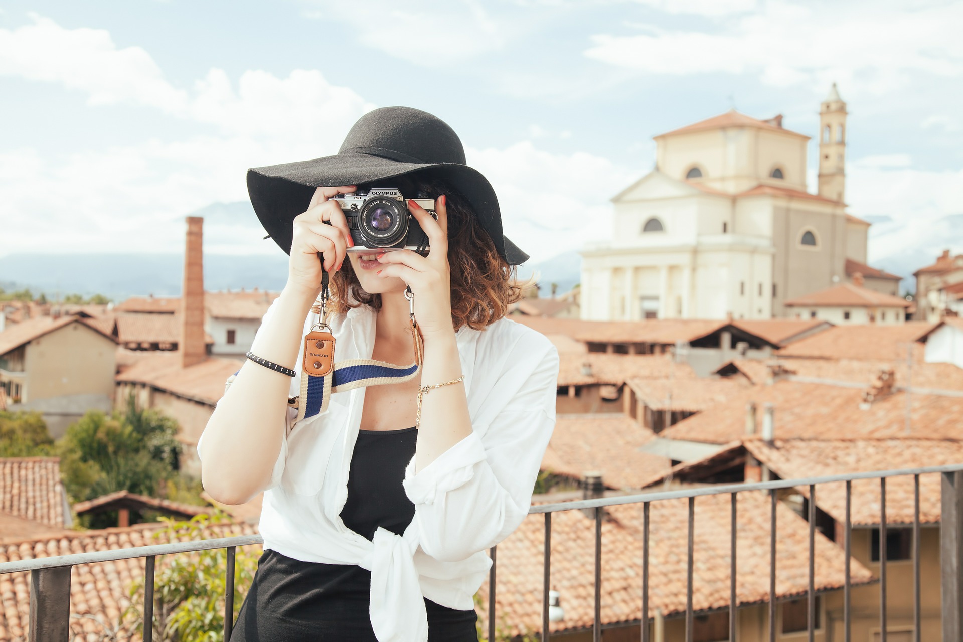 Tourist takes a photo with the camera