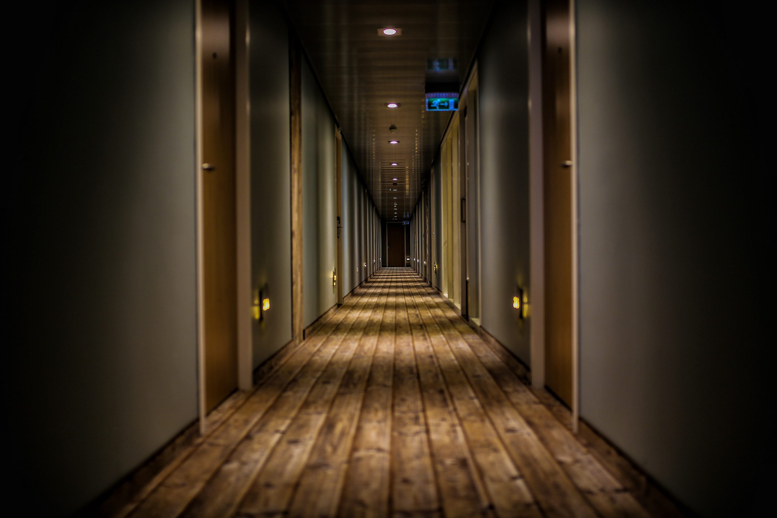 Empty hotel long corridor