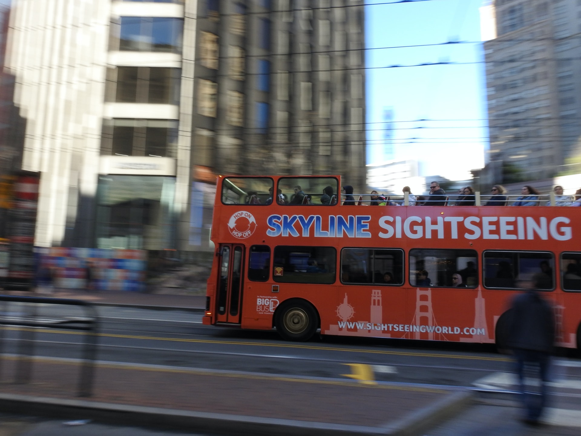 Skyline Sightseeing travels on city street